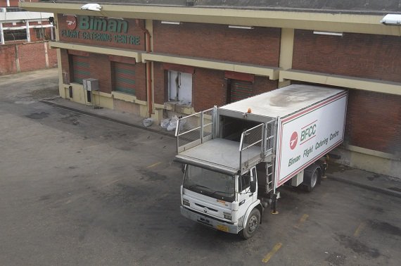 A Biman Airlines catering truck on the rear side of the building, in which the delicious meals for the passenger’s pleasure are prepared