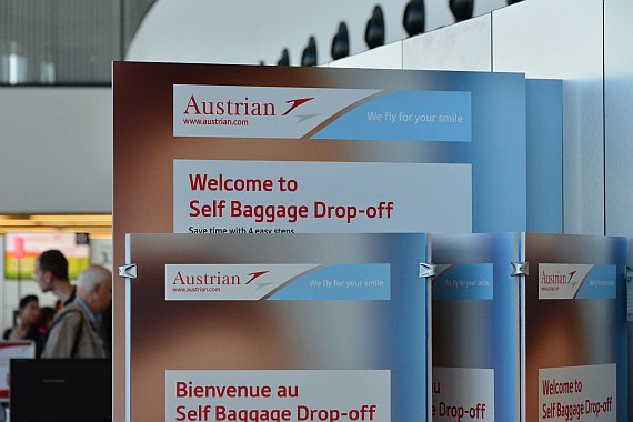 AUA Austrian Airlines Self Baggage Drop off Hinweisschilder Foto PA Austrian Wings Media Crew