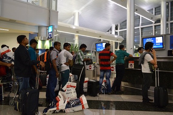 Passengers waiting for their flight to Dhaka, via Chittagong. The amount of duty free bags was astonishing.