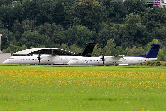 AUA AUstrian Airlines Tyrolean Q400 LOWI_160814_OE_LGO_und_OE_LGP_01 Christian Schöpf